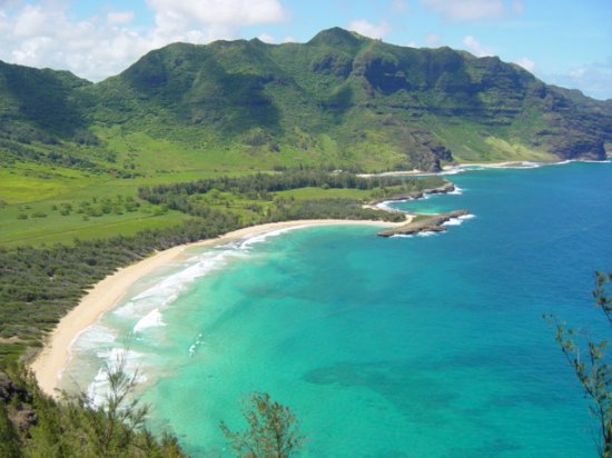 kipu-kai-from-air a body of water with a mountain in the background